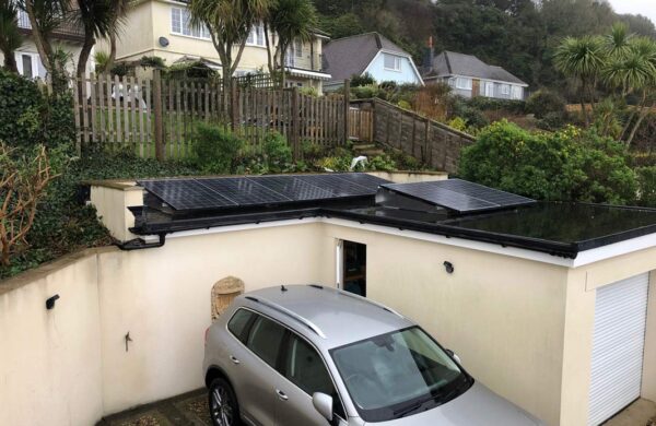 Garden office with solar panel system on the flat roof isle of wight