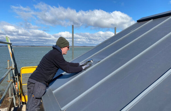 Solar panel brackets fitted to roof by island renewables