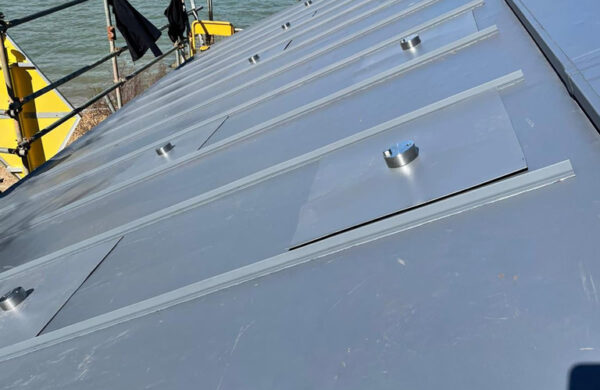 Solar panel brackets completed on a roof by island renewables