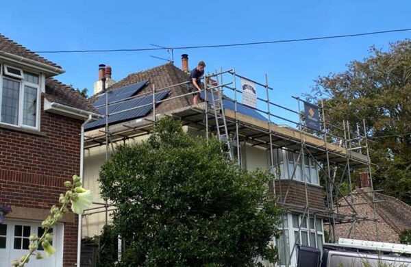 front view of house with solar panels fitted by island renewables