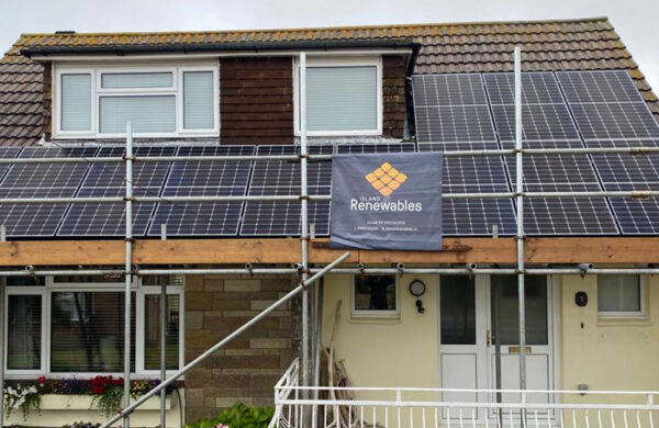front view of house with solar panels on roof Island renewables