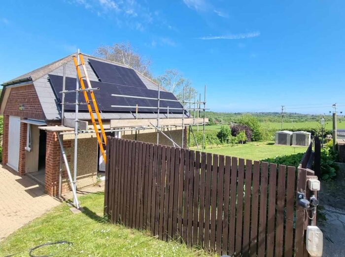 solar panels fitted to a detatched garage roof by island renewables isle of wight