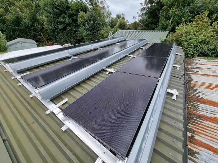 Solar panels fitted to metal roof by Island Renewables isle of wight