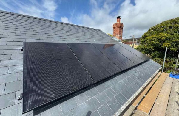 black solar panels installed on a roof by island renewables isle of wight