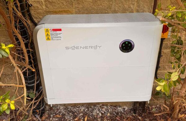 sigenergy battery storage unti installed on a wall of a property on the isle of wight