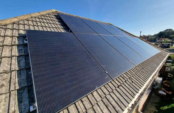 All black solar panels installed on a property roof on the isle of wight