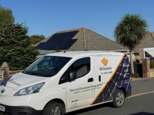 Island Renewables work van parked in front of property with a roof mounted solar installation on the isle of wight